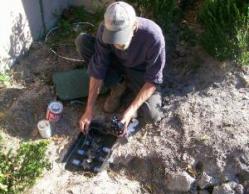 Mesquite TX sprinkler repair technician replaces valve array